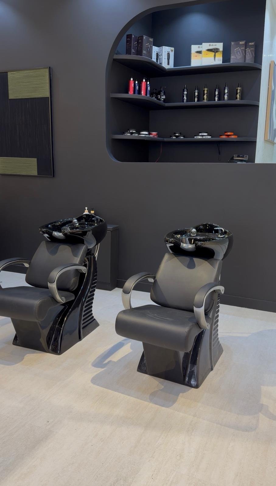 Reclining hair wash basins where the Japanese head spa is performed at Brass Barber in Al Barsha, Dubai